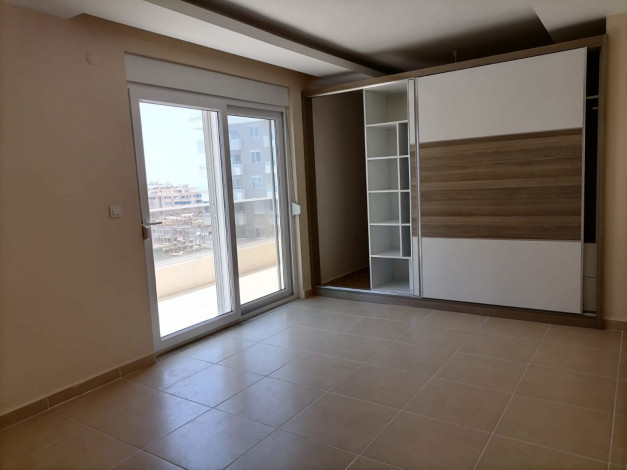 Двухуровневый четырехкомнатный пентхаус с видом на море и горы, район Махмутлар, 200 м2 - Ракурс 42