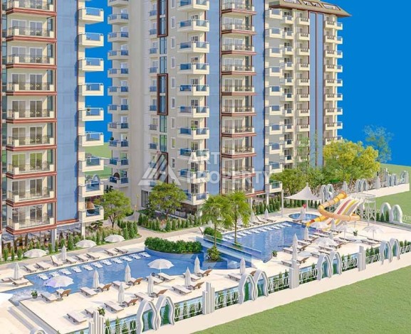 Выгодные под инвестиции апартаменты в строящемся комплексе комфорт класса в развитом районе Махмутлар - Ракурс 1