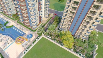 Выгодные под инвестиции апартаменты в строящемся комплексе комфорт класса в развитом районе Махмутлар - Ракурс 13