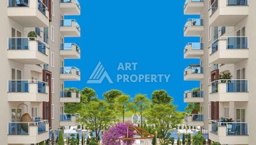 Выгодные под инвестиции апартаменты в строящемся комплексе комфорт класса в развитом районе Махмутлар - Ракурс 14