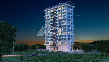 Новые апартаменты 1+1 в стильном комплексе развитого района Махмутлар - Ракурс 3