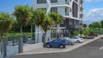Новые апартаменты 1+1 в стильном комплексе развитого района Махмутлар - Ракурс 5