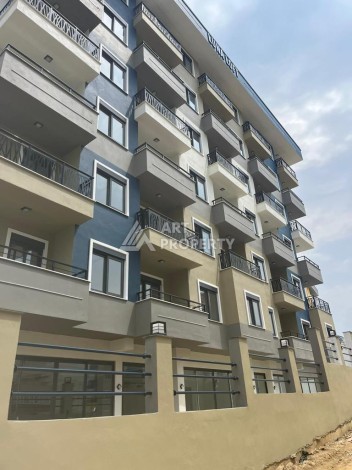 Новые апартаменты 1+1 в комплексе с инфраструктурой развитого района Махмутлар - Ракурс 0