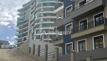 Новые апартаменты 1+1 в комплексе с инфраструктурой развитого района Махмутлар - Ракурс 17