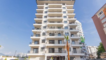Новые апартаменты в комплексе с развитой инфраструктурой русскоговорящего района Махмутлар - Ракурс 1
