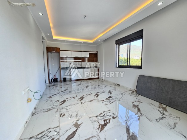 Новые апартаменты в комплексе с развитой инфраструктурой русскоговорящего района Махмутлар - Ракурс 2