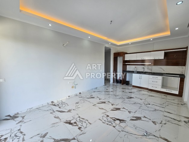 Новые апартаменты в комплексе с развитой инфраструктурой русскоговорящего района Махмутлар - Ракурс 3