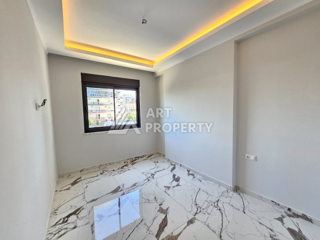 Новые апартаменты в комплексе с развитой инфраструктурой русскоговорящего района Махмутлар - Ракурс 4