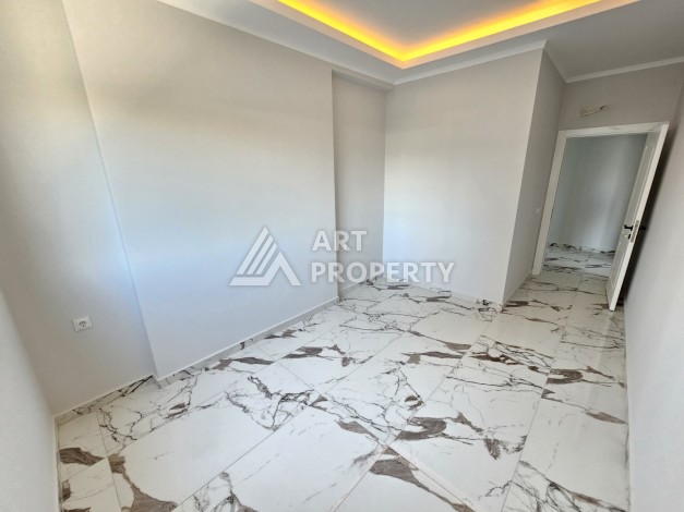 Новые апартаменты в комплексе с развитой инфраструктурой русскоговорящего района Махмутлар - Ракурс 5