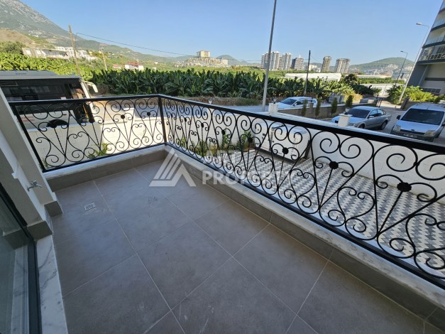 Новые апартаменты в комплексе с развитой инфраструктурой русскоговорящего района Махмутлар - Ракурс 8