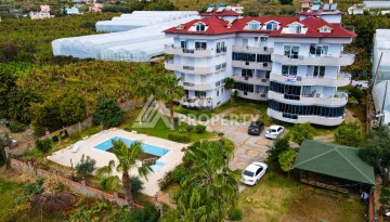 Просторные апартаменты 2+1 в уютном комплексе в близи от моря в зеленом районе Демирташ - Ракурс 13