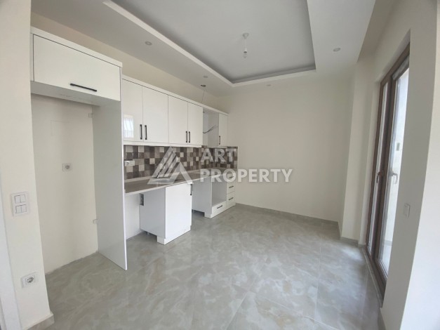 Новые апартаменты 2+1 в центре Алании район Гюллерпынары - Ракурс 3