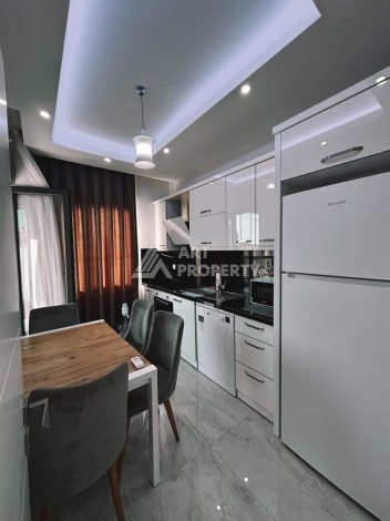 Меблированные апартаменты 2+1 с отдельной кухней в центре Алании - Ракурс 7