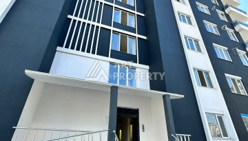 Бюджетная квартира 1+1 в новом комплексе в Махмутларе в 400 м от моря! - Ракурс 1