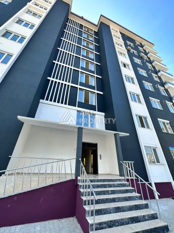 Бюджетная квартира 1+1 в новом комплексе в Махмутларе в 400 м от моря! - Ракурс 0