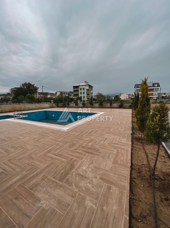 Квартира 1+1 в новом комплексе в развивающемся районе Газипаша - Ракурс 9