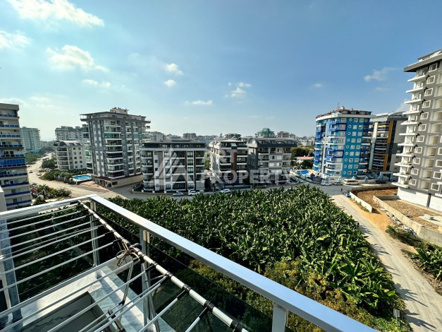 Огромная квартира 2+1 с мебелью в новом доме в Махмутларе! - Ракурс 11