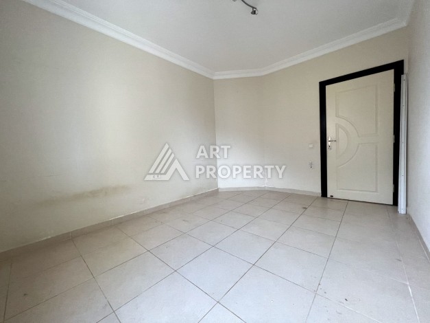 Просторная 2+1 с отдельной кухней в турецком доме развитого района Махмутлар - Ракурс 5