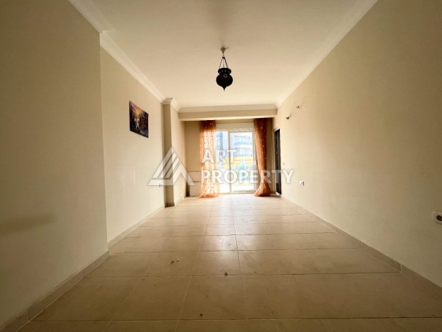 Просторная 2+1 с отдельной кухней в турецком доме развитого района Махмутлар - Ракурс 6