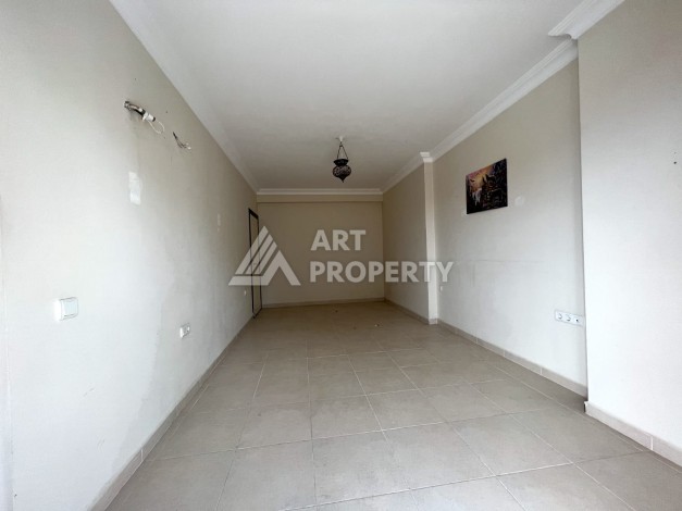 Просторная 2+1 с отдельной кухней в турецком доме развитого района Махмутлар - Ракурс 7