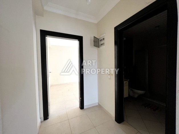 Просторная 2+1 с отдельной кухней в турецком доме развитого района Махмутлар - Ракурс 15