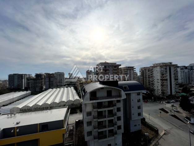 Просторная 2+1 с отдельной кухней в турецком доме развитого района Махмутлар - Ракурс 29