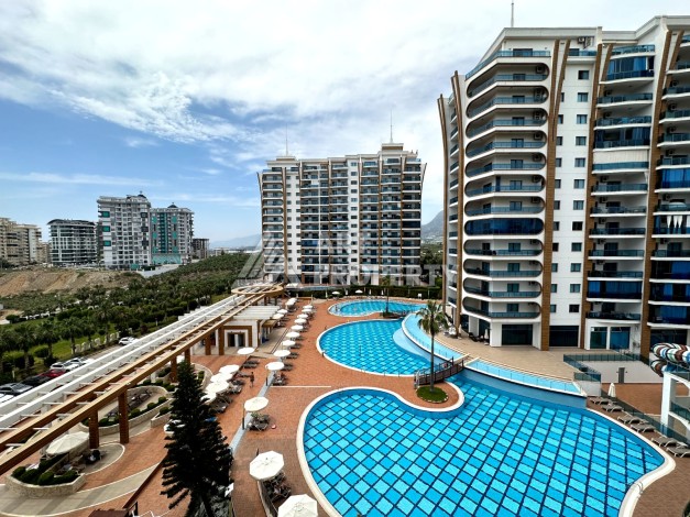 Апартаменты 2+1 в премиальном комплексе развитого района Махмутлар - Ракурс 21