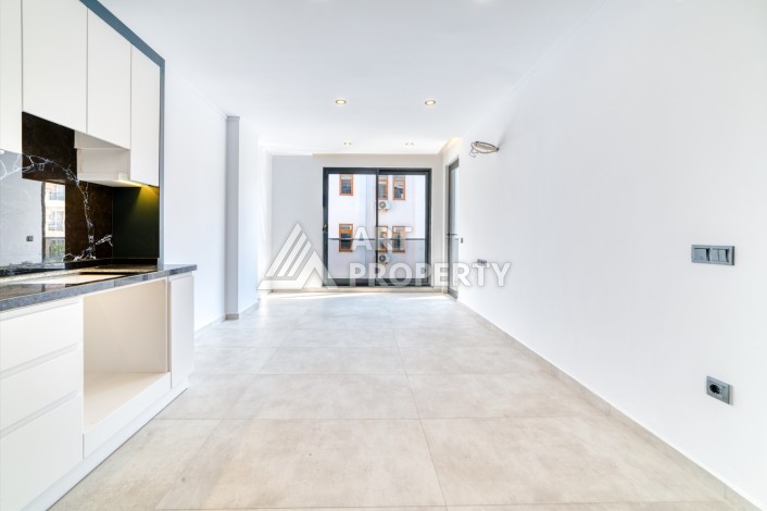 Новые апартаменты 1+1 в премиальном комплексе в центре Алании - Ракурс 4