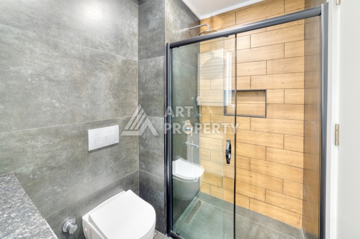 Новые апартаменты 1+1 в премиальном комплексе в центре Алании - Ракурс 7