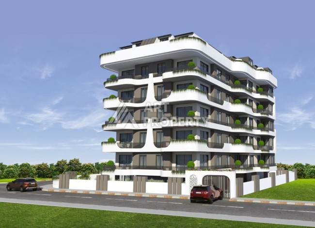 Апартаменты 1+1 на этапе строительства в комфортном комплексе развитого района Махмутлар - Ракурс 0