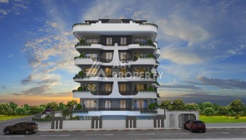 Апартаменты 1+1 на этапе строительства в комфортном комплексе развитого района Махмутлар - Ракурс 2