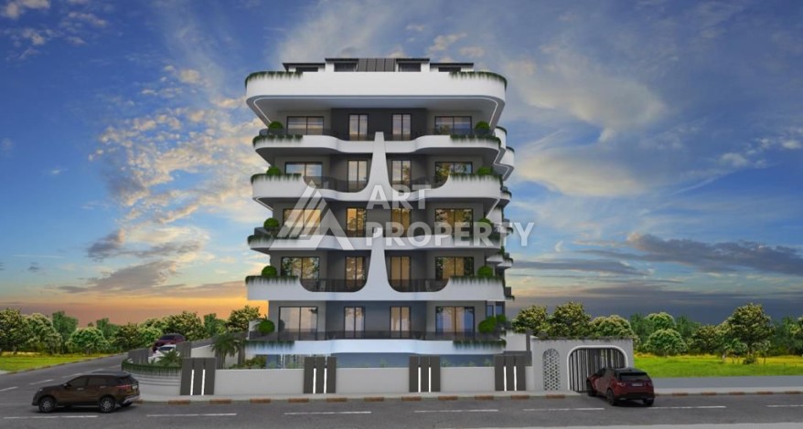 Апартаменты 1+1 на этапе строительства в комфортном комплексе развитого района Махмутлар - Ракурс 1
