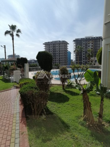 Просторная квартира 2+1 в развитом районе Махмутлар рядом с морем - Ракурс 3