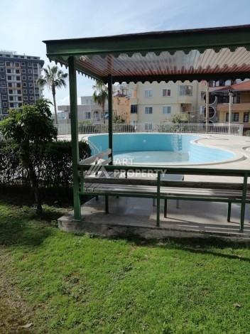 Просторная квартира 2+1 в развитом районе Махмутлар рядом с морем - Ракурс 4