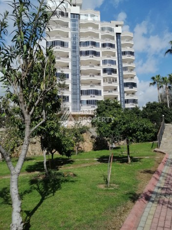 Просторная квартира 2+1 в развитом районе Махмутлар рядом с морем - Ракурс 8