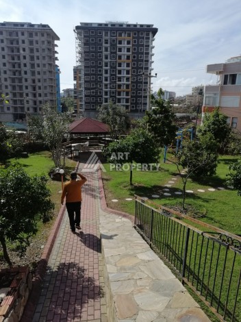 Просторная квартира 2+1 в развитом районе Махмутлар рядом с морем - Ракурс 9