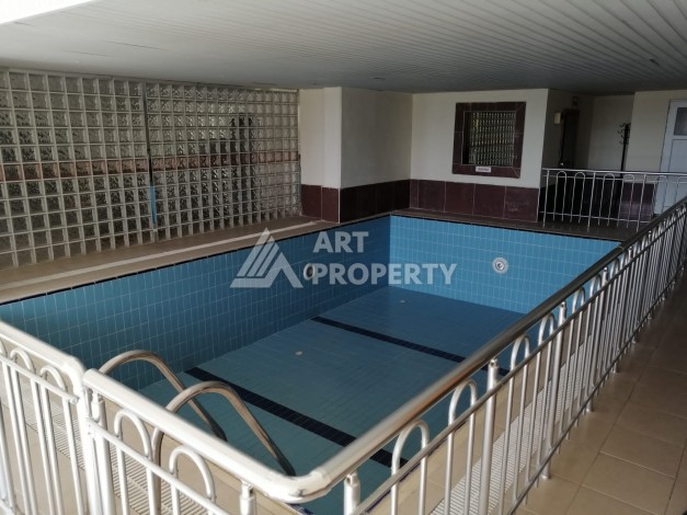 Просторная квартира 2+1 в развитом районе Махмутлар рядом с морем - Ракурс 25