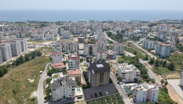 Новый проект квартир с видом на море в зеленом районе Авсаллар, от 100м² до 175м² - Ракурс 2
