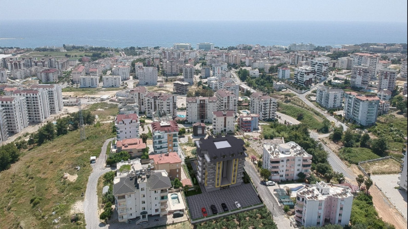 Новый проект квартир с видом на море в зеленом районе Авсаллар, от 100м² до 175м² - Ракурс 1