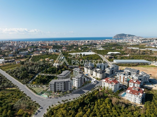 Новый привлекательный проект в центре Алании с инфраструктурой 5 звездочного отеля Алании - Ракурс 14