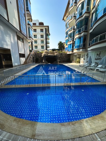 Квартира 3+1 на первой линии моря в Кестеле Аланья в уютном комплексе - Ракурс 31