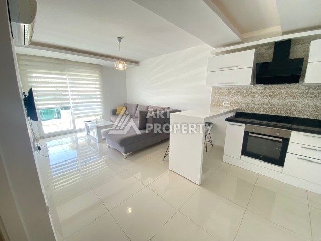 Квартира 1+1 в центре Алании от известного застройщика - Ракурс 8