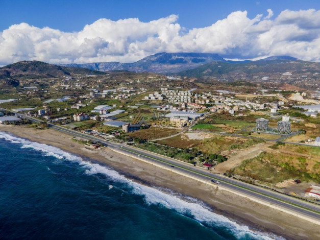 Новый инвестиционный проект в фантастическом месте Демирташ, Алания, рядом со Средиземным морем - Ракурс 18