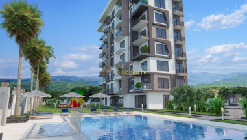 Новый инвестиционный проект в фантастическом месте Демирташ, Алания, рядом со Средиземным морем - Ракурс 21