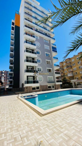 Квартира 1+1 в центральной части Махмутлара, 70 м2 - Ракурс 7