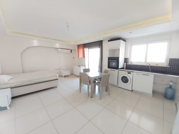 Квартира 1+1 в центральной части Махмутлара, 70 м2 - Ракурс 13