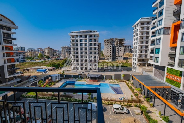 Просторная квартира 1+1 в популярном районе Махмутлар - Ракурс 2