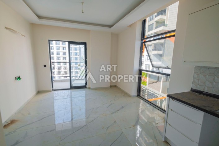 Просторная квартира 1+1 в популярном районе Махмутлар - Ракурс 4