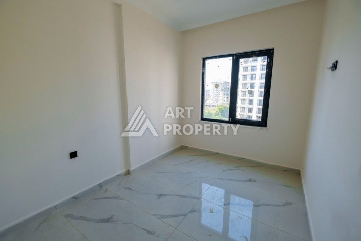 Просторная квартира 1+1 в популярном районе Махмутлар - Ракурс 6