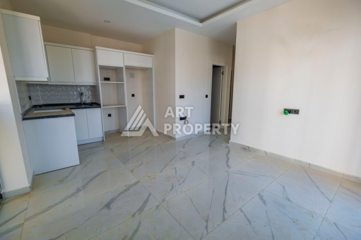 Просторная квартира 1+1 в популярном районе Махмутлар - Ракурс 8